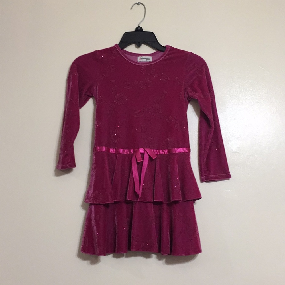 A purple sparkly flower dress